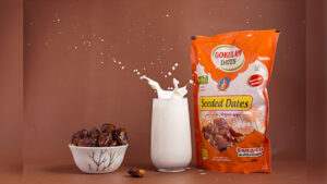 Product shot of Dates with splashing milk